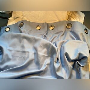 Curtain single panel, light blue, silver tone grommets. 42” x 82”‎